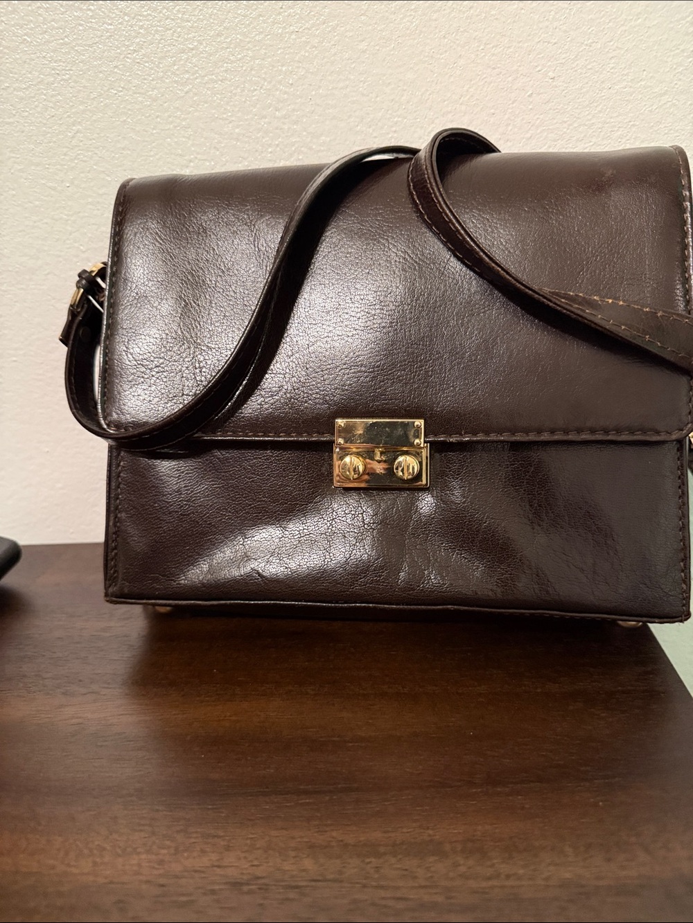 Structured Dark Brown Leather Messenger Bag with Gold Lock